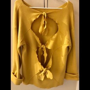 Yellow sweater bow back